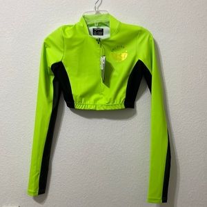 Long sleeved crop swim top. Size L. New with tags. Tri Sirena